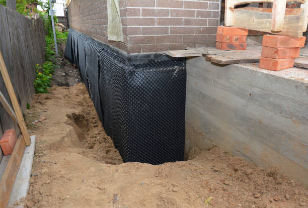 SJ Waterproofing Pros technician performing targeted Interior Drainage System assessment in Union, MI
